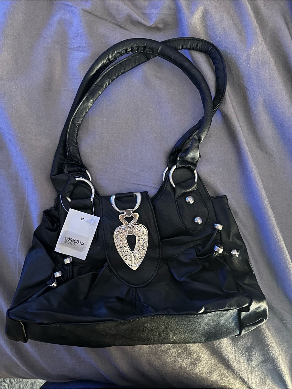 Black Women's Shoulder Bag with Decorative Silver Pendant